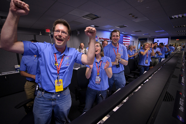 NASA Mars Science Laboratory employees react after the MSL rover Curiosity successfully landed on Mars. Photo Credit: (NASA/Bill Ingalls) 2012_12_nasa